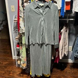 Shine gray color nice outfit size medium has  stretch but not too much